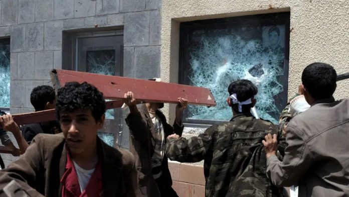 Yemeni protesters storm the US embassy.