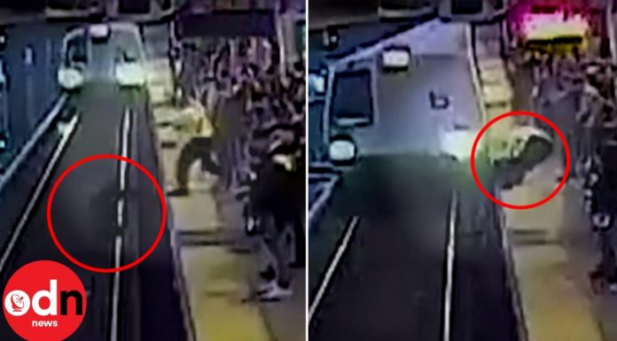 Incredible train track rescue of man who falls on tracks