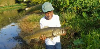 Ke'mari Cooper of Quincy, Florida lands a BIG fish and releases it
