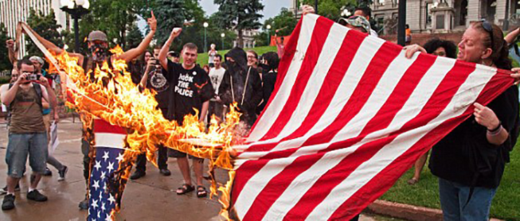 American flag set on fire