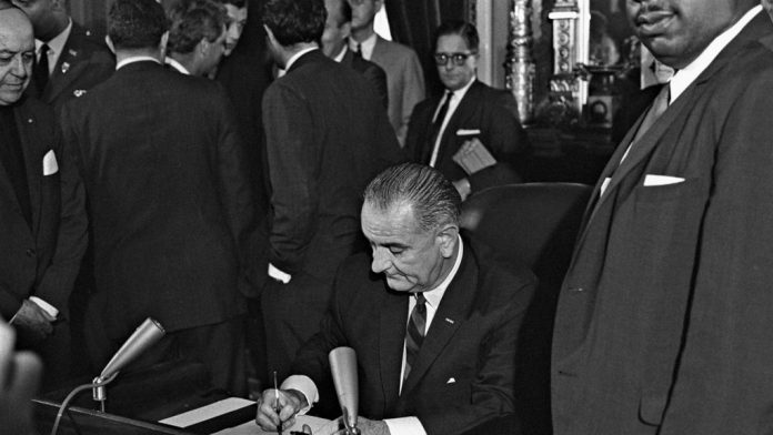 Signing the voters Rights Act