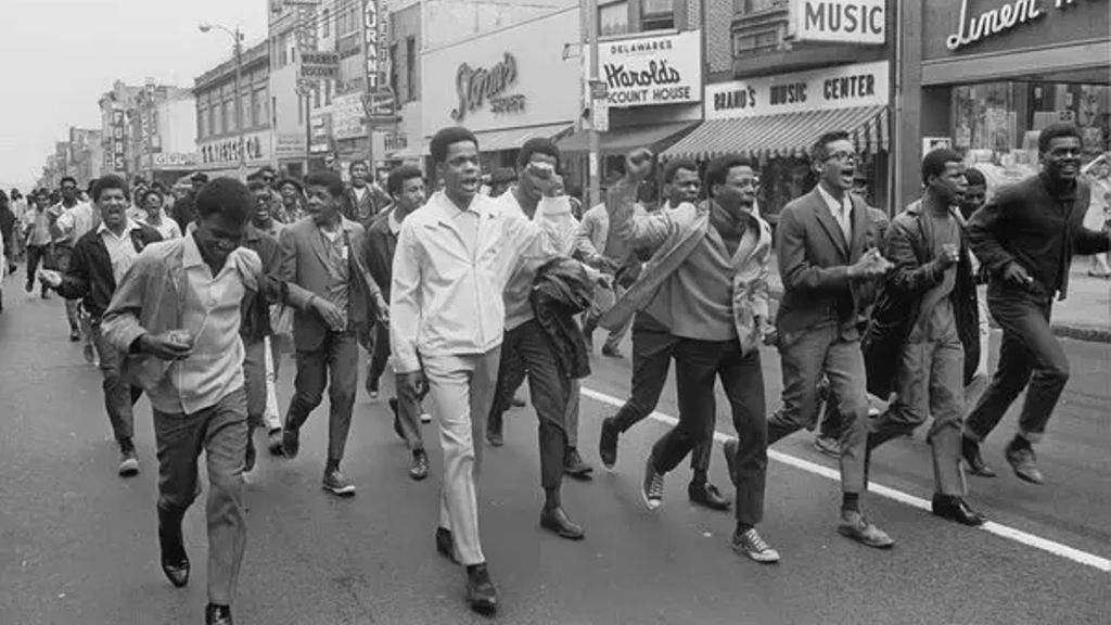 Marching in Wilmington in the aftermath of the 1968 rioting and National Guard occupation.
