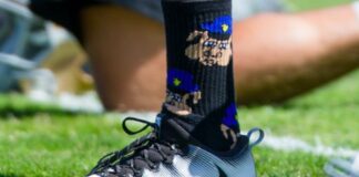 Colin Kaepernick wearing pig socks