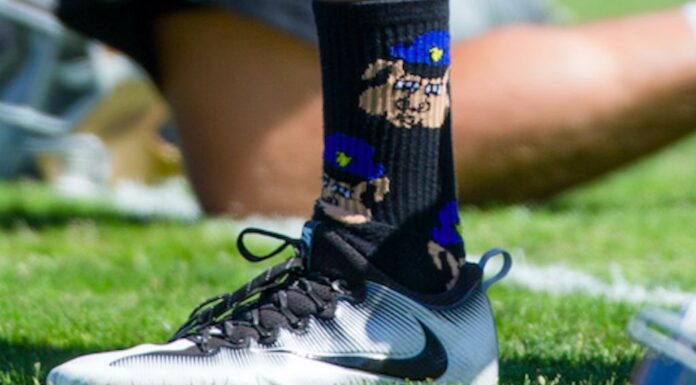 Colin Kaepernick wearing pig socks