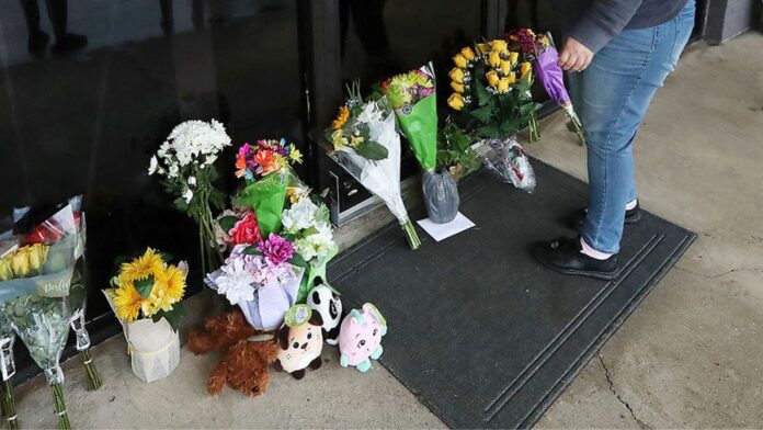 Dropping off flowers at Youngs Asian Massage parlor Dropping off flowers at Youngs Asian Massage parlor