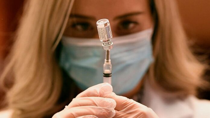 Pharmacist Madeline Acquilano draws a syringe of the Johnson & Johnson COVID-19 vaccine Pharmacist Madeline Acquilano draws a syringe of the Johnson & Johnson COVID-19 vaccine