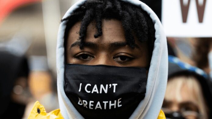 A protester with an A protester with an