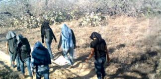 Illegal aliens walking through private ranch land in Jim Hogg County, Texas,