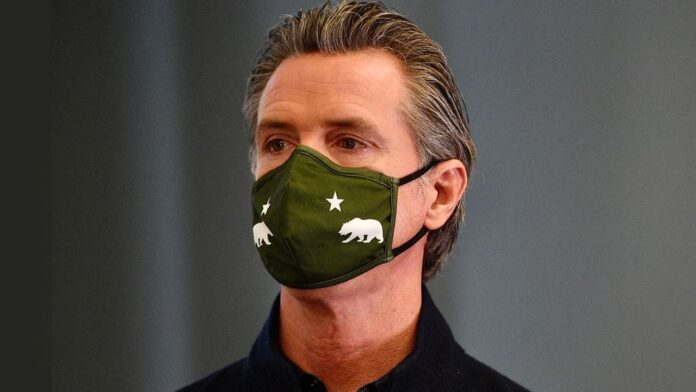 CA Gov. Gavin Newsome in a mask