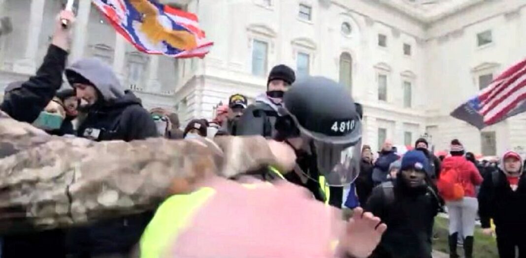 Scott Fairlamb punches a Metropolitan Police