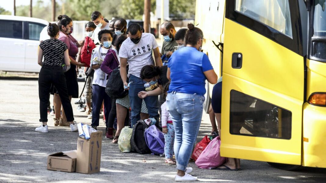 Illegal Immigrants boarding bus in Del Rio Texas