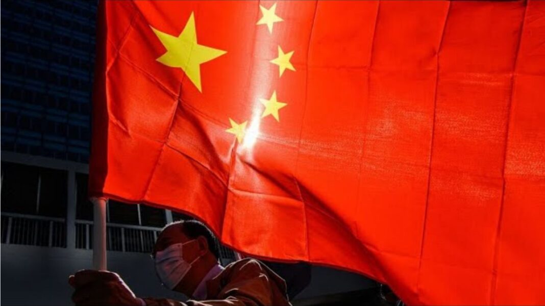 Chinese Man with Chinese Flag