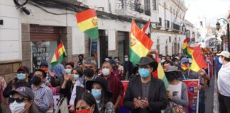 Protesters march in the streets of Sucre, Bolivia