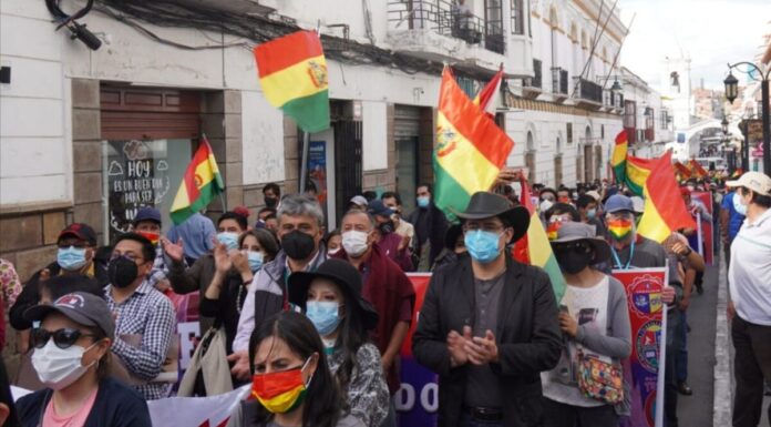 Protesters march in the streets of Sucre, Bolivia