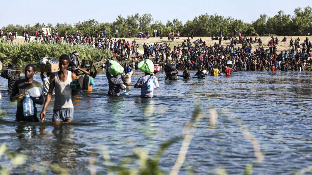 Illegal immigrants cross the Rio Grande