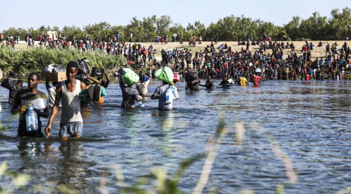 Illegal immigrants cross the Rio Grande