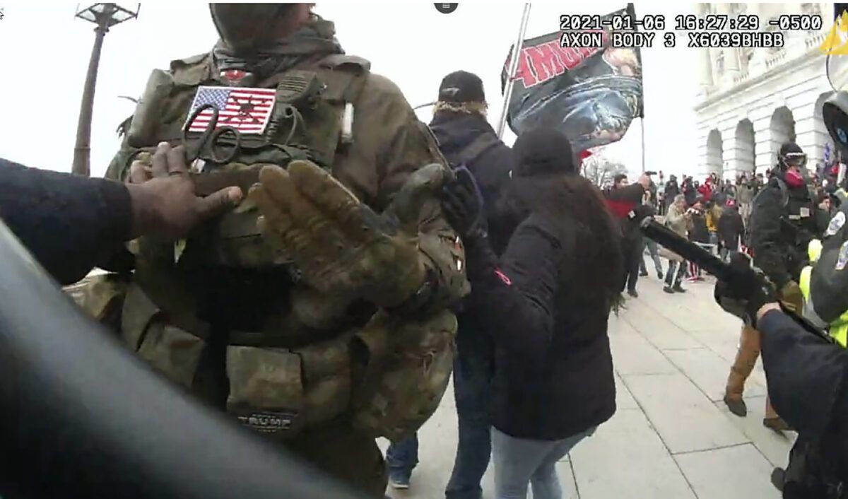 Jeremy Brown shown on police bodycam footage being told to back away from police lines at the U.S. Capitol on Jan. 6, 2021. (U.S. Department of Justice)