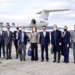 Taiwan's Foreign Minister Joseph Wu (4th R) stands with a U.S. delegation including retired Admiral Mike Mullen (3rd R), former chair of the Joint Chiefs of Staff, as they arrive at Taipei Songshan Airport in Taiwan on March 1, 2022.