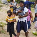 Hondurans Prepare to Cross Rio Grande