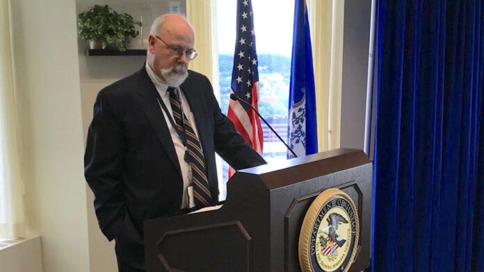 John Durham speaks at a conference John Durham speaks at a conference