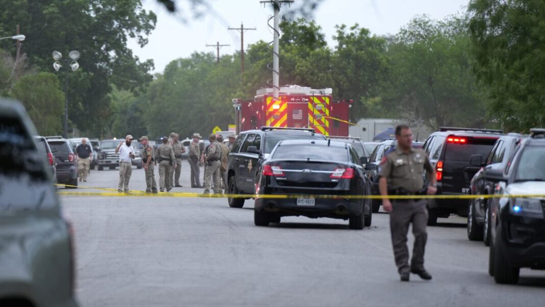 Police cordon off the streets around Robb Elementary School