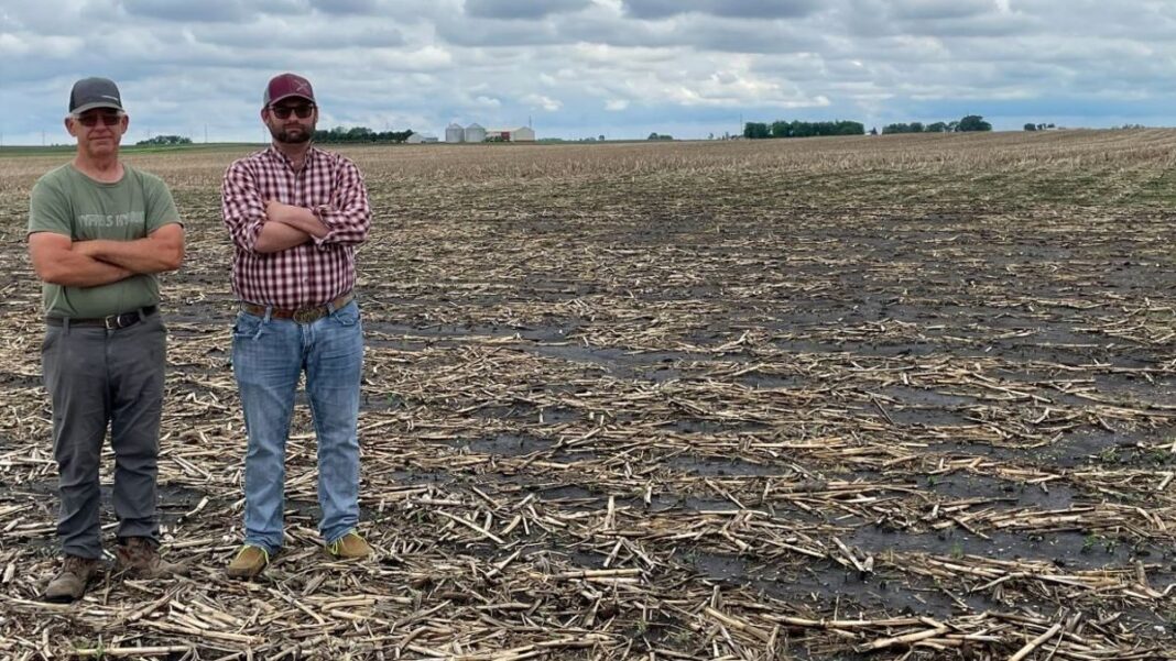 Allen Hayek and his son Austin Hayek on Family’s Farm