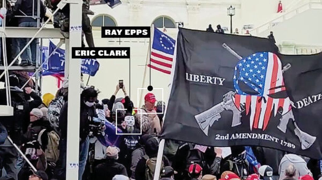 Eric Clark and Ray Epps stand next to each other on the West side of the Capitol on Jan. 6. (Black Conservative Preacher/Graphic by The Epoch Times)