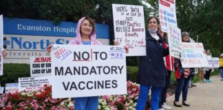 Health care workers protest against NorthShore University HealthSystem's vaccine mandate