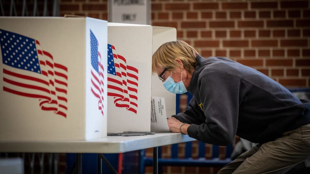 Voters in Des Moines precincts 43, 61 and 62 cast their ballots at Roosevelt High School.