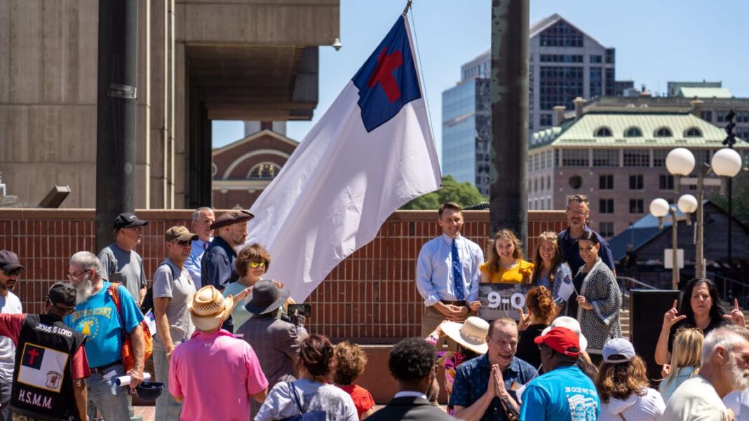 Camp Constitutions' Christian flag was hoisted over Boston City Hall