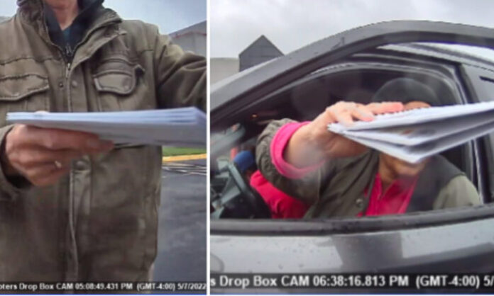 Individuals are captured delivering more than two ballots at the drop box Individuals are captured delivering more than two ballots at the drop box