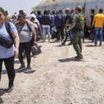 Border Patrol agent organizes a large group of illegal immigrants