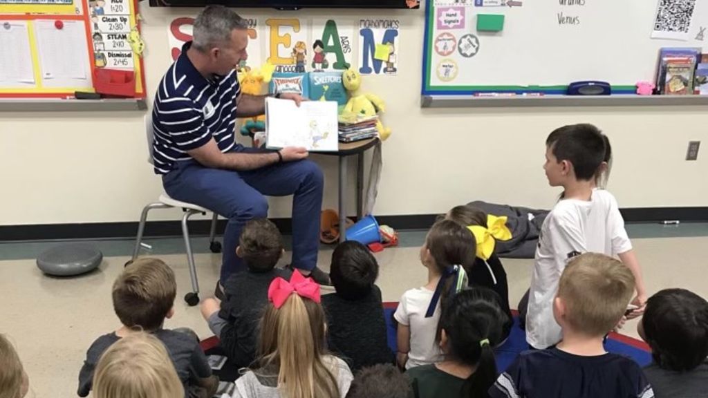 Shawn Hayston reads to his son’s elementary school class. (Courtesy of Shawn Hayston)