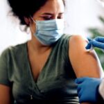 Woman gets Vaccinated