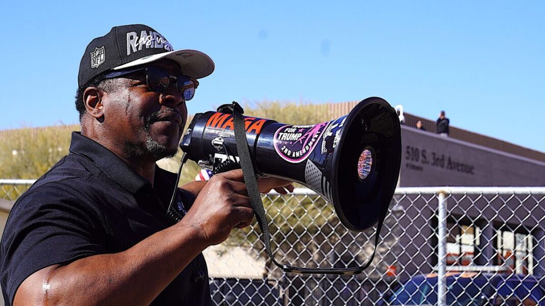 Republican pastor Jerone Davison addresses a prayer rally