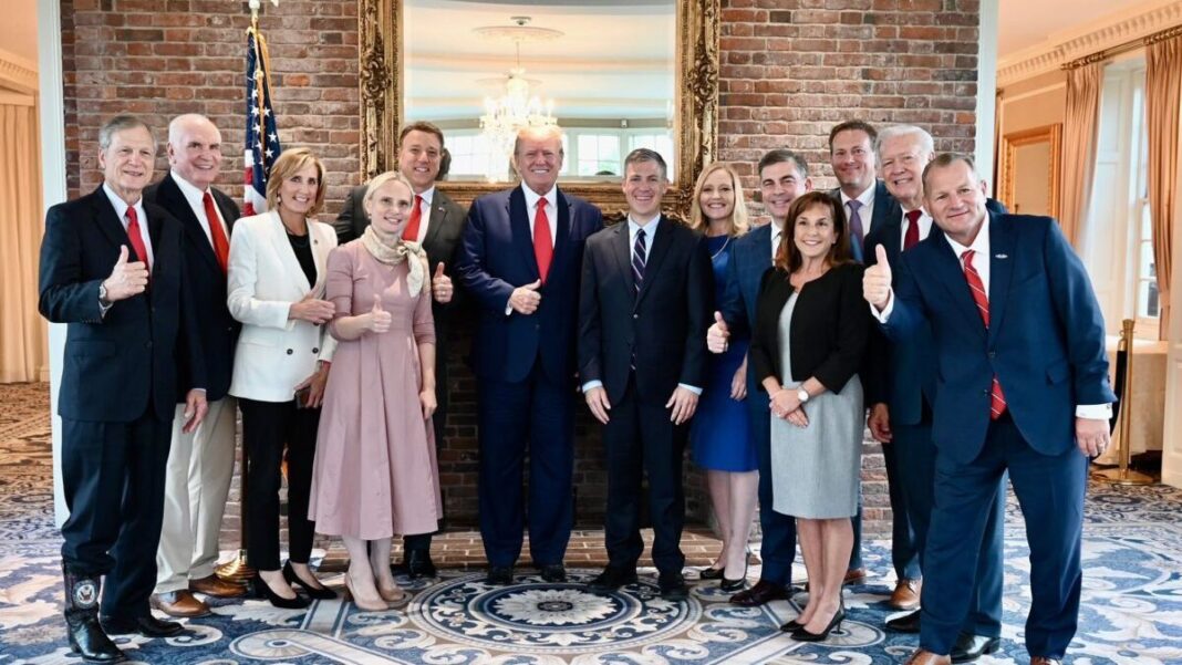 President Donald Trump and members of the committee