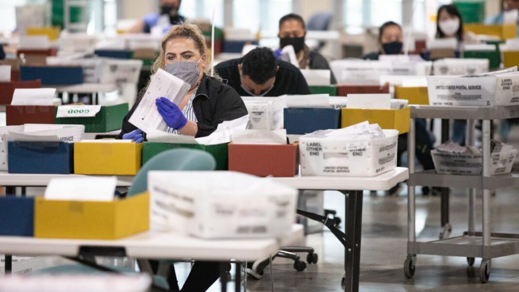 People count California recall ballot votes at a Los Angeles Registrar site