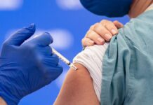 Nurse Receives COVID-19 Vaccine
