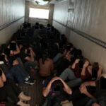 Eighty-one migrants hidden in back of tractor trailer, 2022.