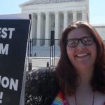 Lauren Handy, the director of activism with Progressive Anti-Abortion Uprising, protests outside the U.S. Supreme Court