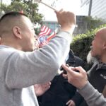 Pro-China protesters clash with Chinese dissidents in front of the St. Regis hotel in San Francisco on Nov. 14, 2023.