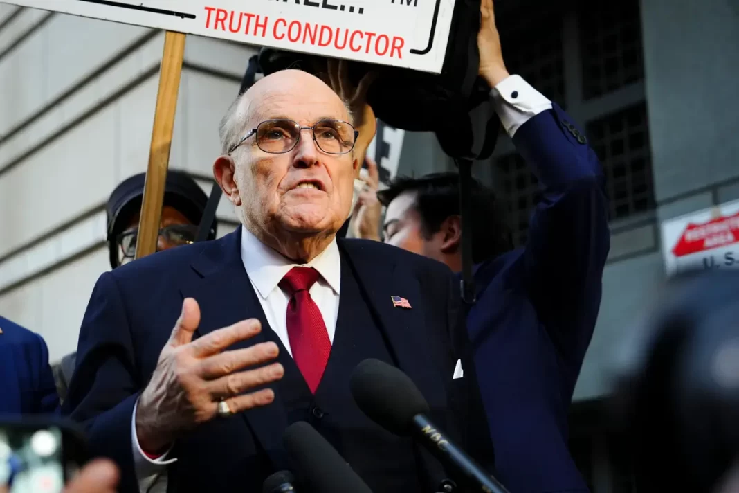 Rudy Giulian leaves the E. Barrett Prettyman U.S. District Courthouse