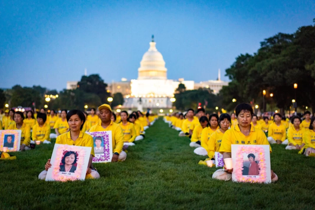 Falun Gong adherents at a candlelight vigil 2023