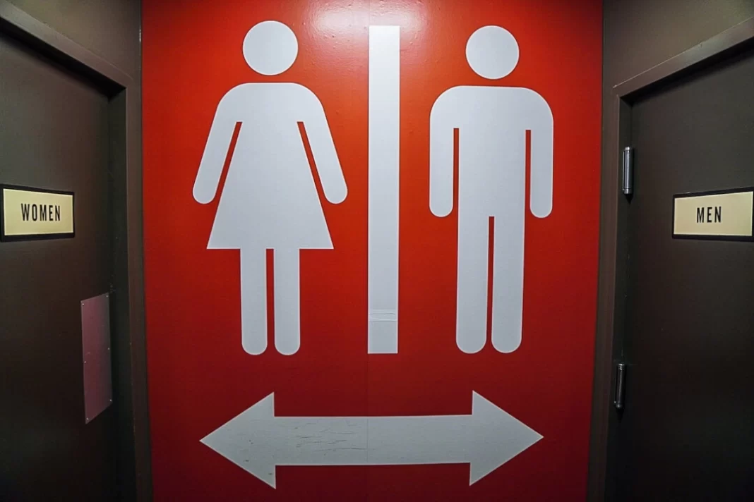 Signage identifies the men’s and women’s restrooms at a business in Chattanooga, Tenn., on Jan. 13, 2023.