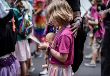 Young girl at annual NYC Pride March in New York City, June 25, 2023.