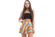Bearded transwoman dressed in a gay pride flag miniskirt. 