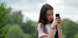 Young Girl Using Smartphone