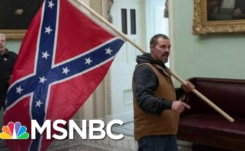 Man Who Carried Confederate Flag In Capitol Has Turned Himself In