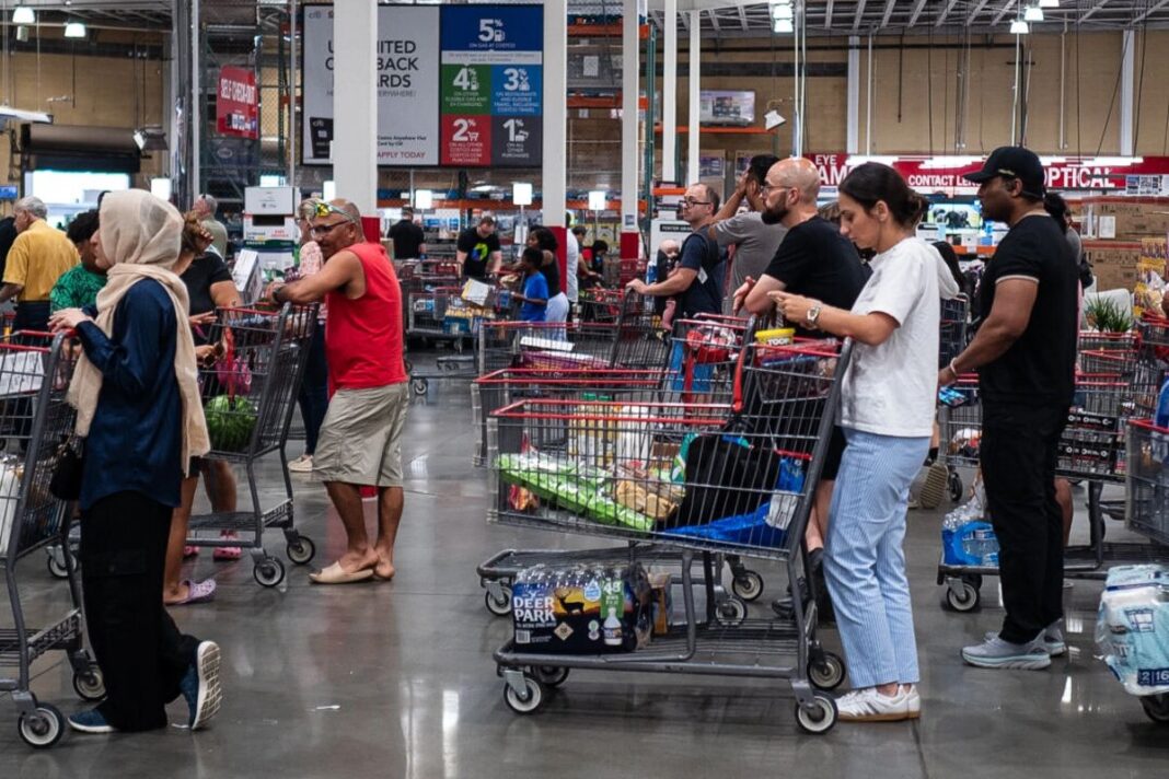 People shop at a store in Elkridge, Md., on July 11, 2025.