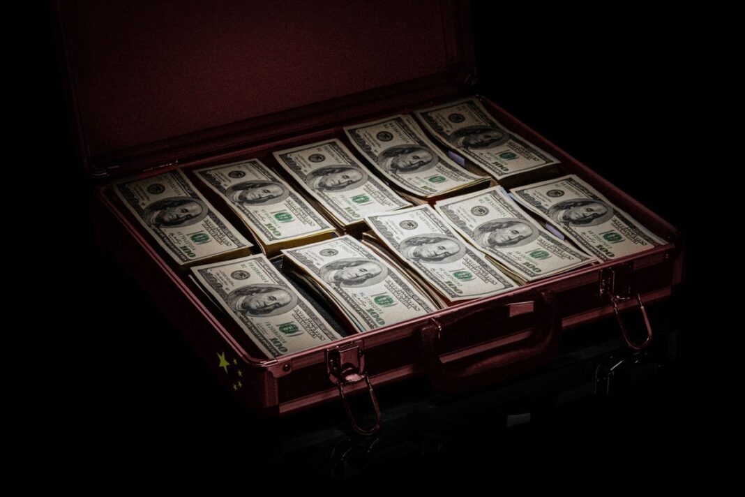US Hundred Dollar bills Filling Briefcase